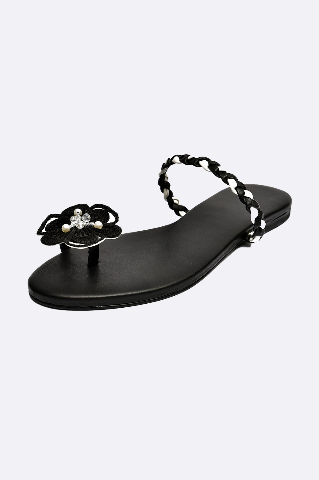 Handmade black leather luxury flat sandal with floral embroidery and pearl detail by Cool Cami, UAE.