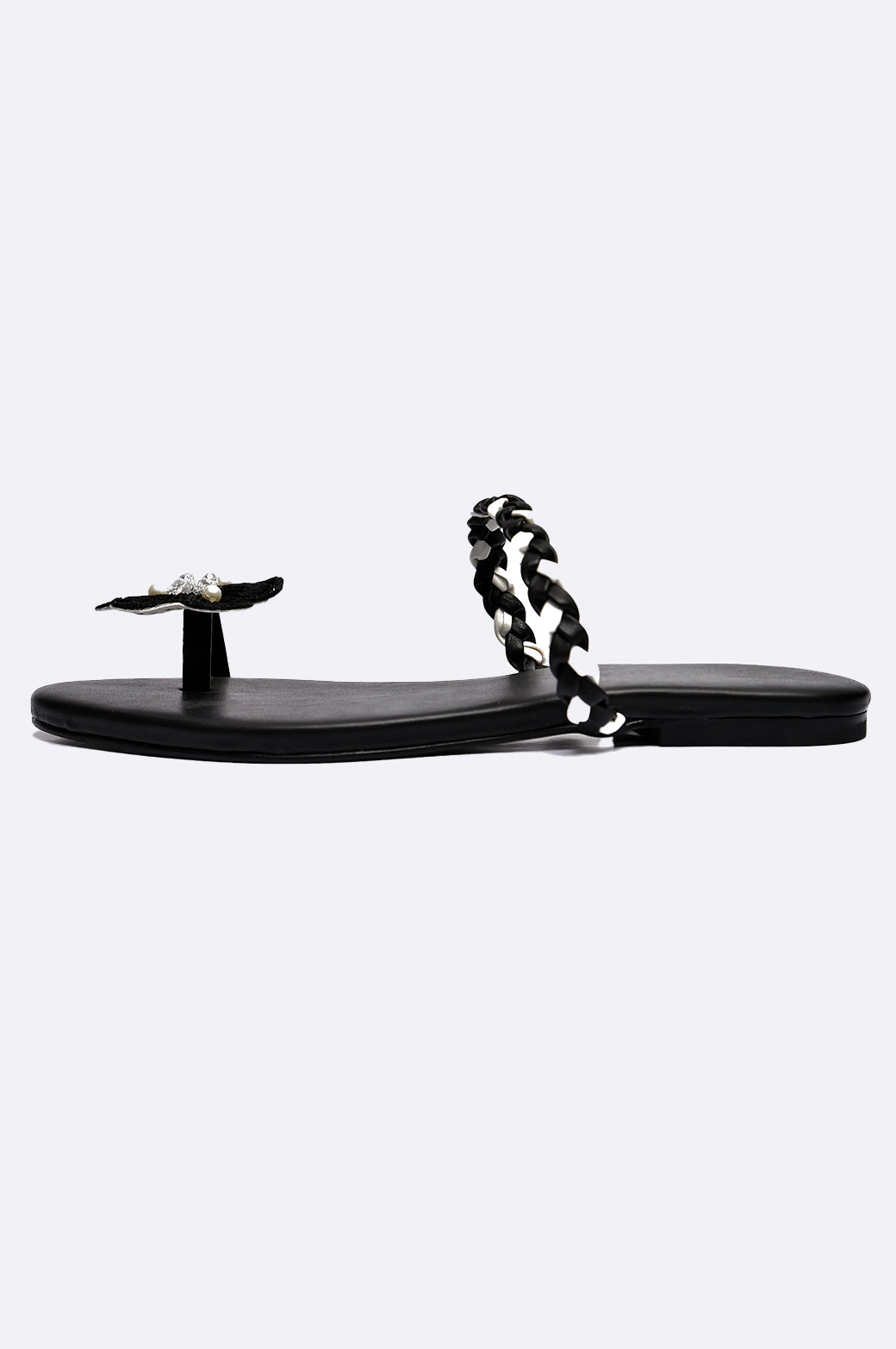 Handmade black leather luxury flat sandal with floral embroidery and pearl detail by Cool Cami, UAE.