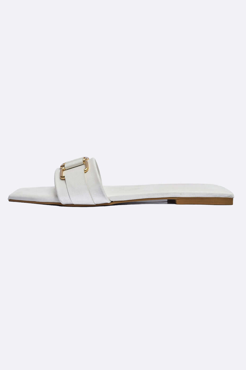 Handmade white leather slide shoes with matte-gold buckles, part of Cool Cami's ladies footwear collection from UAE.