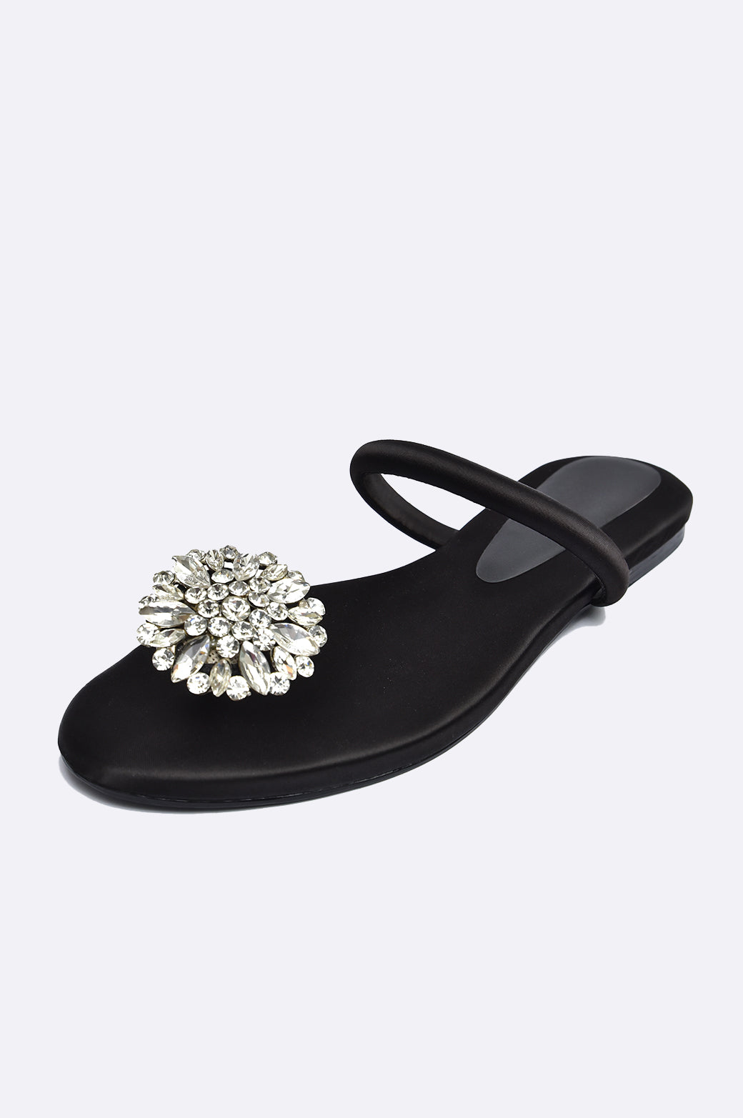 Cool Cami black handmade flat slipper with oversized crystal floral brooch, luxury leather women’s footwear from UAE.