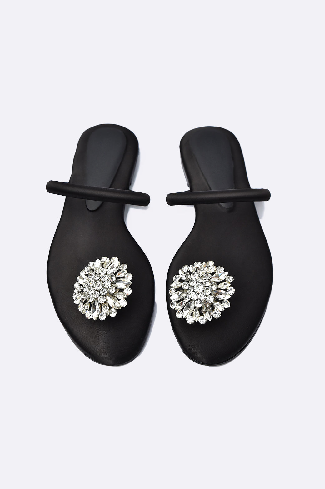 Cool Cami black handmade flat slipper with oversized crystal floral brooch, luxury leather women’s footwear from UAE.
